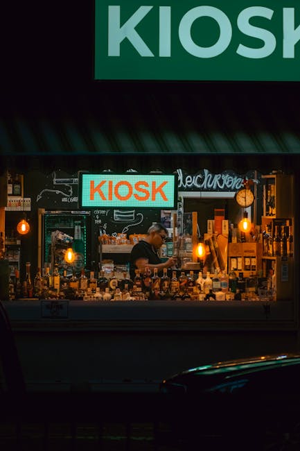 Small retail shops along a city street with pedestrians